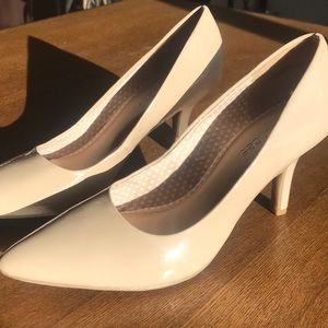 Nude pumps with low heel. Never been worn!